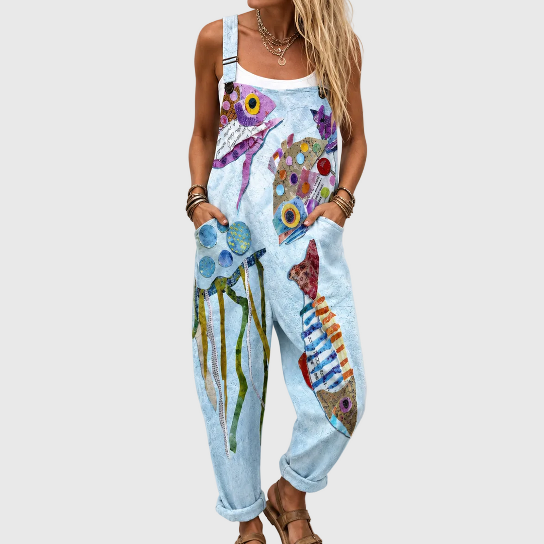 Romy | Pantalón de tirantes azul claro con peces coloridos