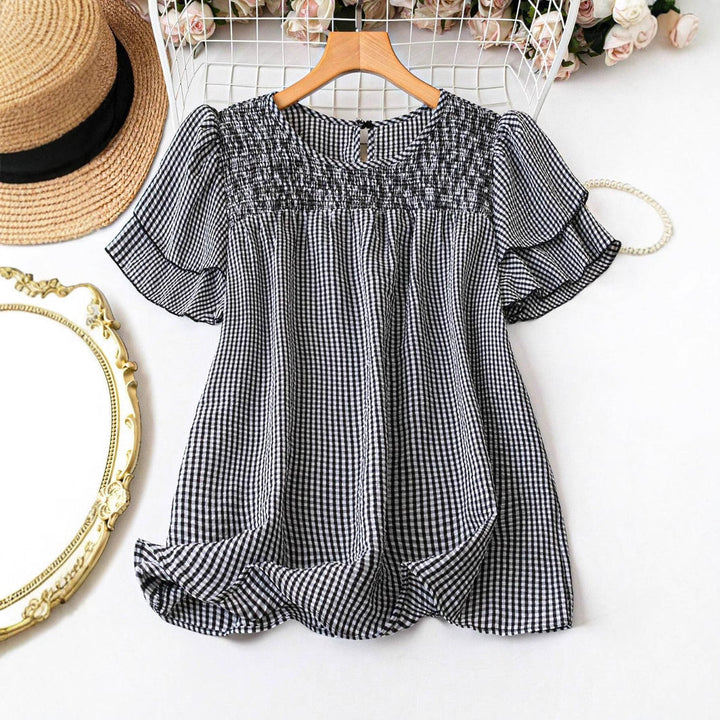 Blusa Vintage Kristel con Mangas Abullonadas a Rayas – Top Retro Atemporal